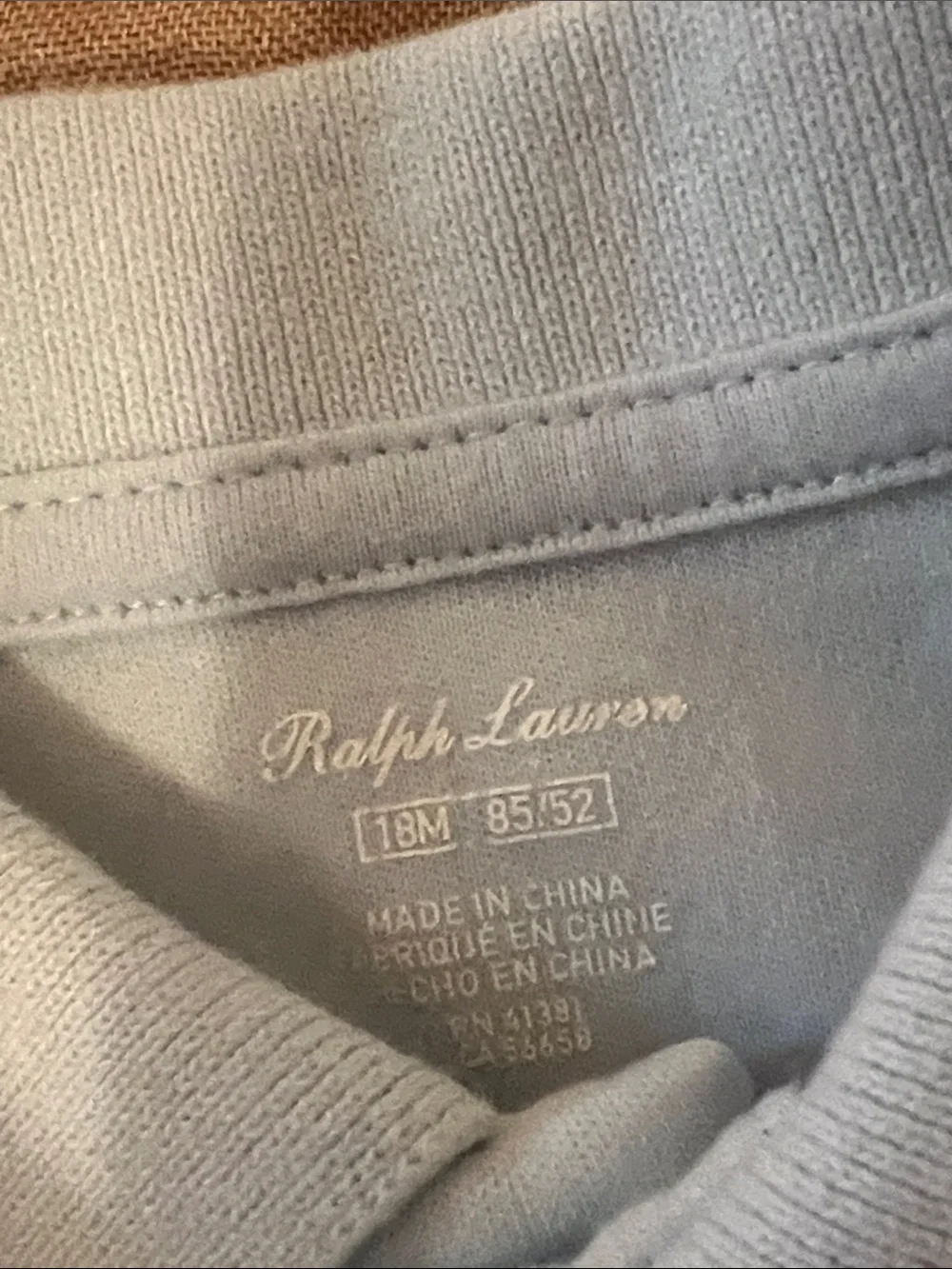 Ralph Lauren Blue Baby Polo Romper with Navy train Print